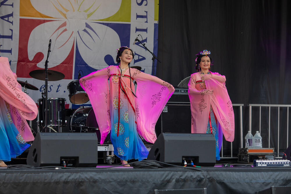 Dancers dance on stage at the Atlanta Dogwood Festival