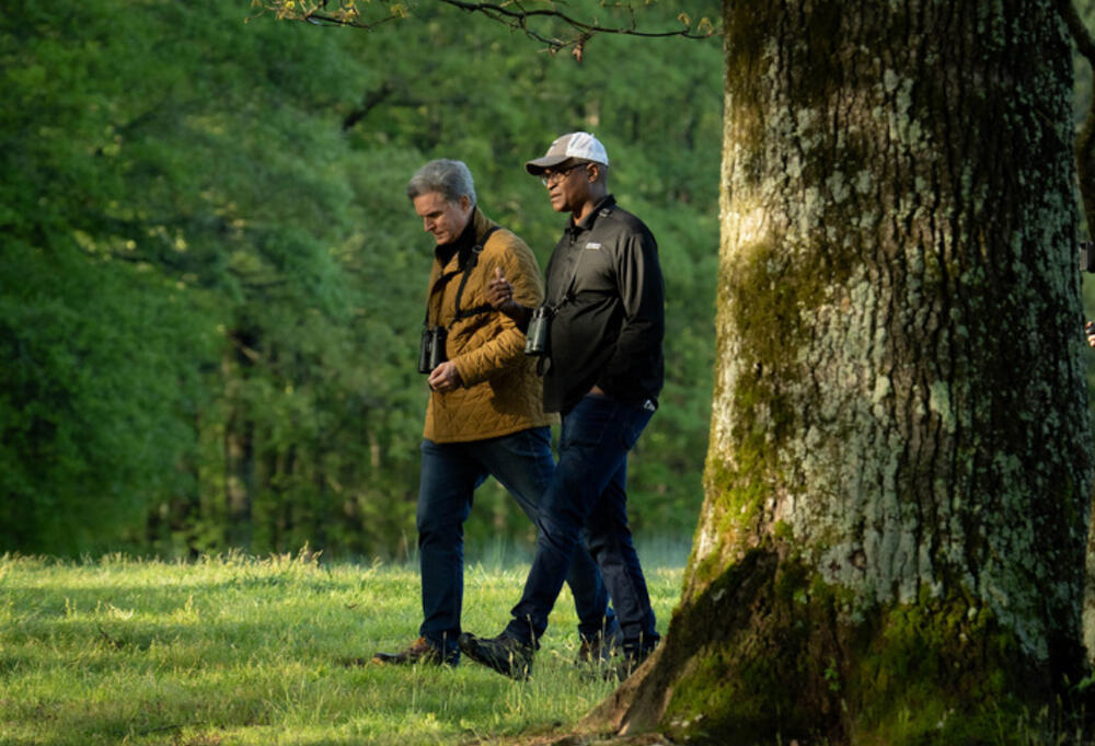 GPB's Jeff Hullinger and President and CEO of the Federal Reserve Bank of Atlanta, Dr. Raphael Bostic walk through nature.