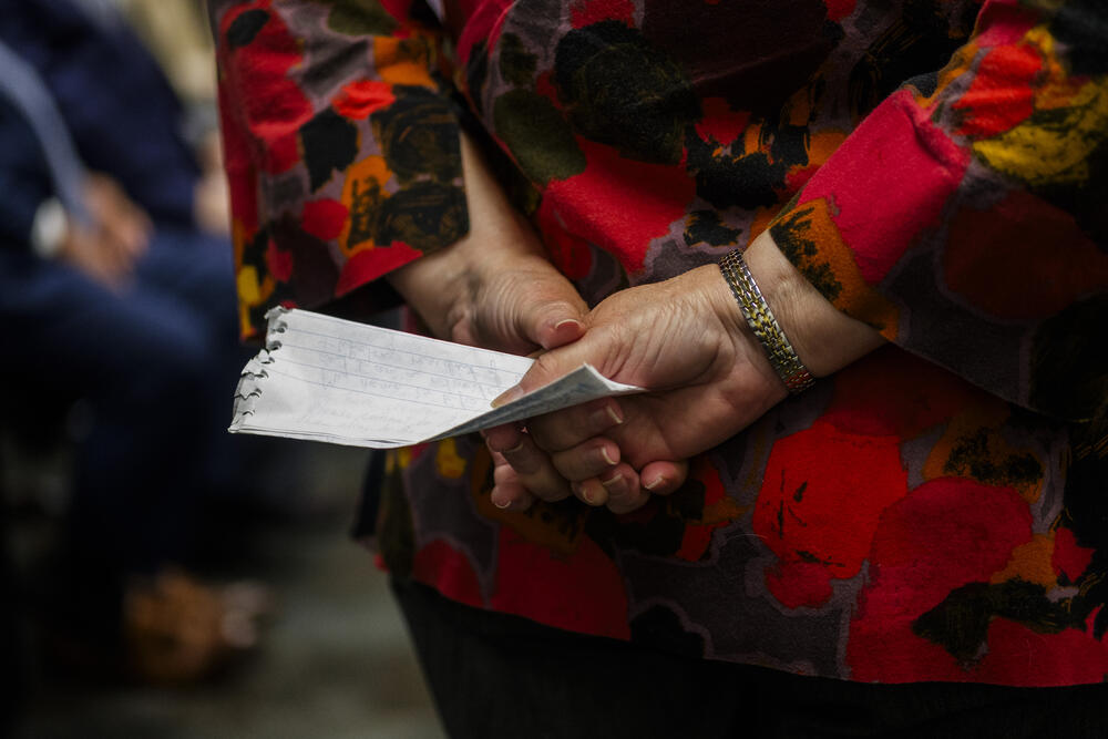 A person holds her written comment before her chance to speak during the public comment section of the Georgia Public Service Commission’s first day of hearings on Georgia Power’s new plan for electricity generation. 