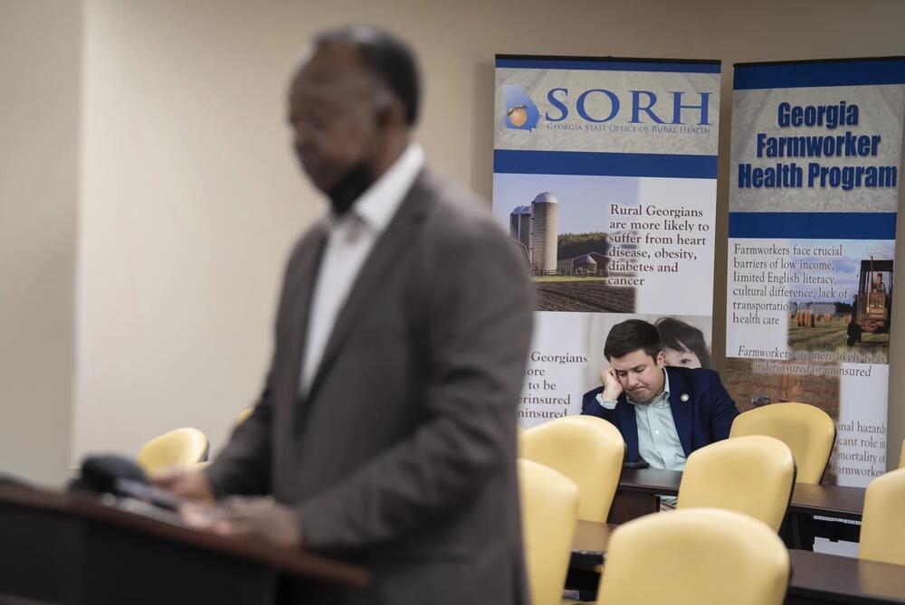Grant Thomas, deputy commissioner for the Georgia Department of Community Health, sits in the back of the room during a public meeting on the Georgia Pathways program in Cordele. Credit: Nicole Craine for ProPublica