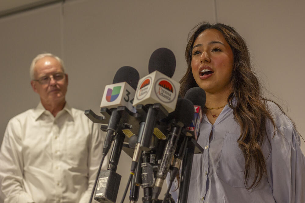 Ximena Arias-Cristobal speaks at a press conference in Atlanta on May 27, 2025 in front of one of her attorneys, immigration lawyer Charles Kuck.