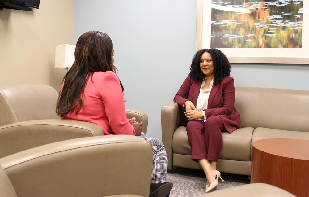 Vanessa and Dr. Avivah McPherson sit in an office at Northside Hospital Atlanta