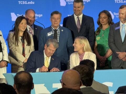 Gov. Brian Kemp signing