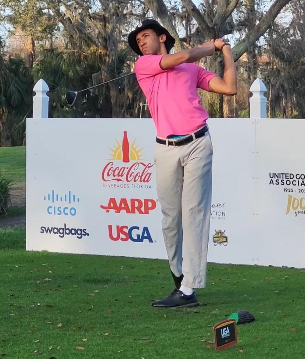 Duncan Reid golfing