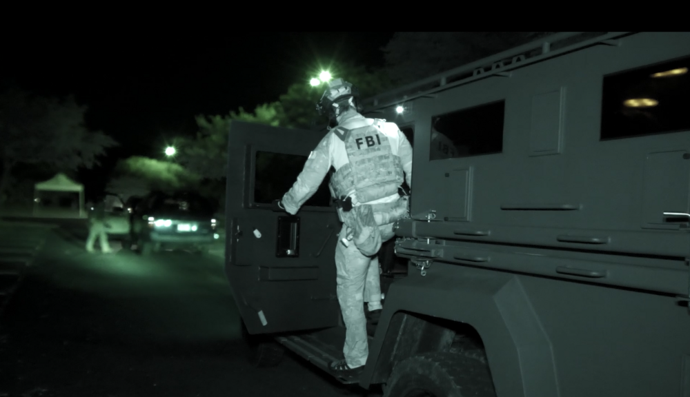 A still from video of the FBI operation in Savannah against a large group of gang members.