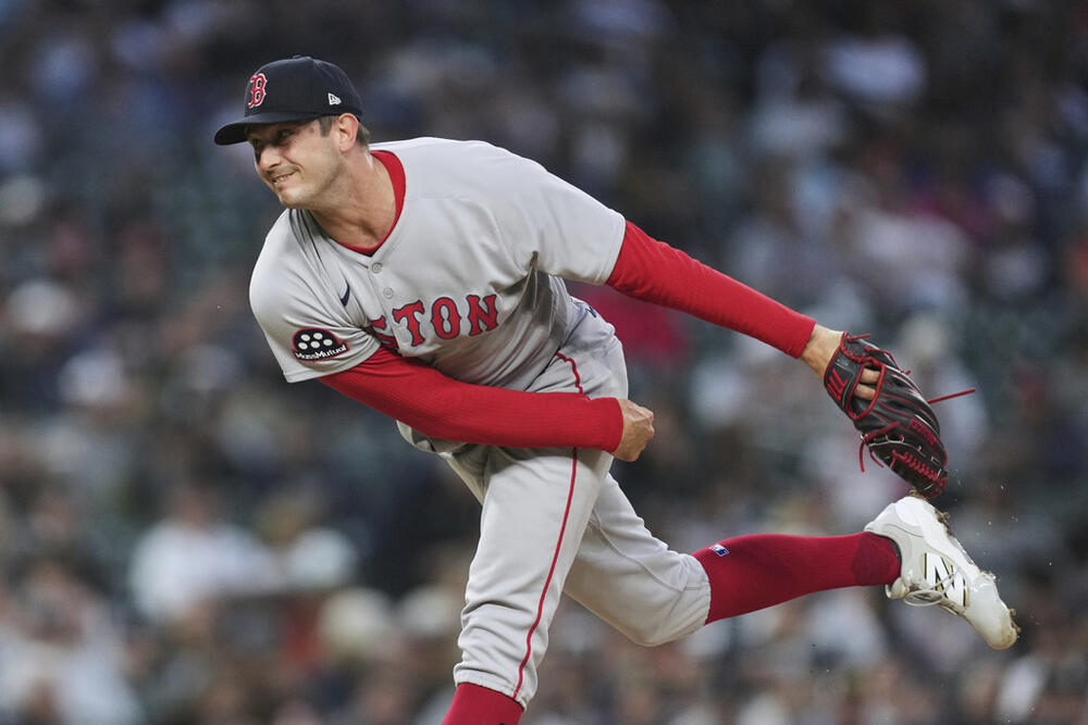 Boston Red Sox pitcher Garrett Whitlock throws against the Detroit Tigers in the sixth inning during a baseball game, Tuesday, May 13, 2025, in Detroit. (AP Photo/Paul Sancya)