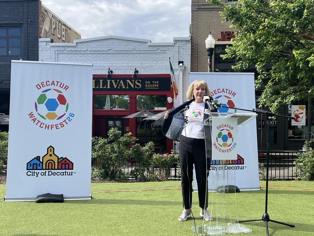Mayor Patti Garrett at the Decatur Watchfest announcement event wearing a shirt with the event logo on May 6, 2025.