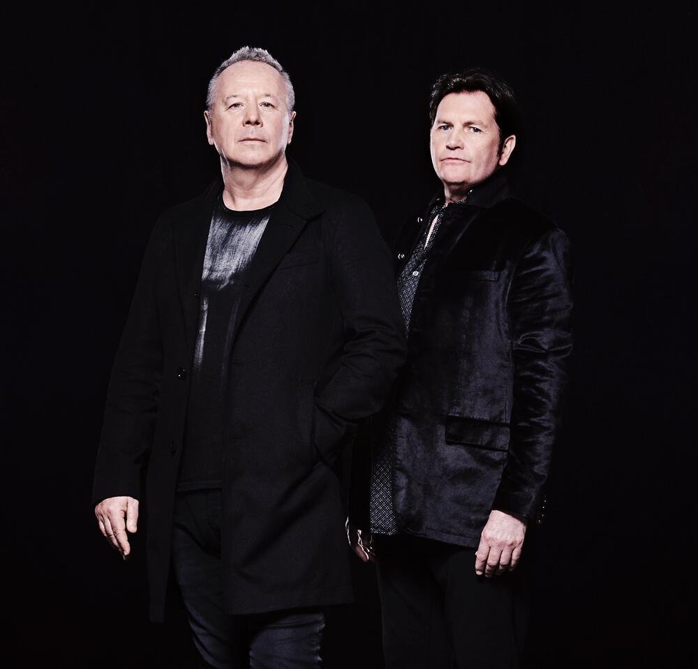 Jim Kerr (left) and Charlie Burchill cofounded Simple Minds with friends in 1977 in Glasgow, Scotland. The band performs at Atlanta's Synovus Bank Amphitheatre at Chastain Park on June 7, 2025.