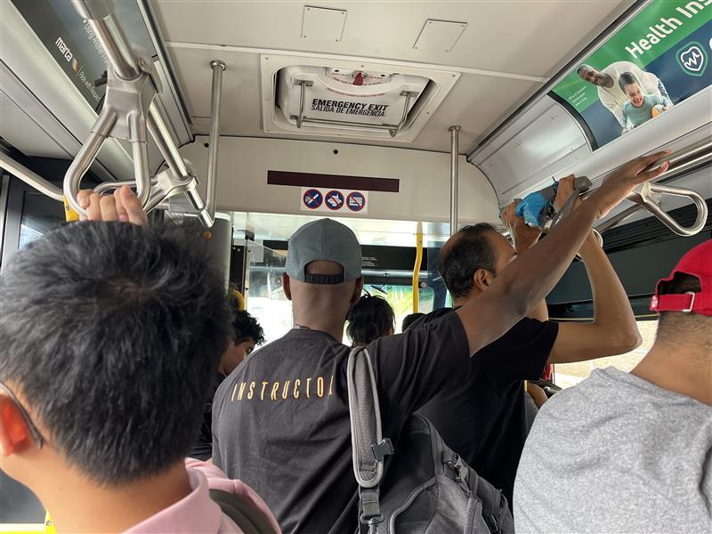 passengers fill the bus so much you can't see out the front window
