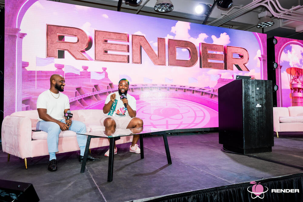 RenderATL Founder and CEO Justin E. Samuels (right) pictured alongside a featured speaker at the 2024 RenderATL tech conference. RenderATL