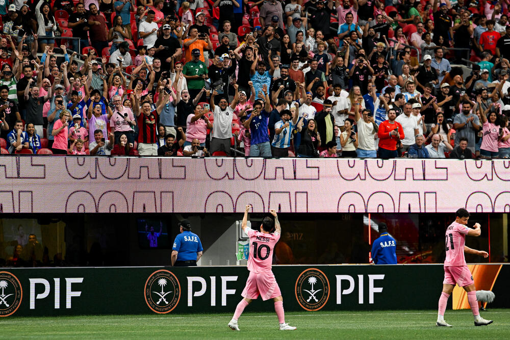 Inter Miami CF star Lionel Messi waves to the crowd in Atlanta's Mercedes-Benz Stadium on June 19, 2025 after the team prevailed over Porto in a FIFA Club World Club match.