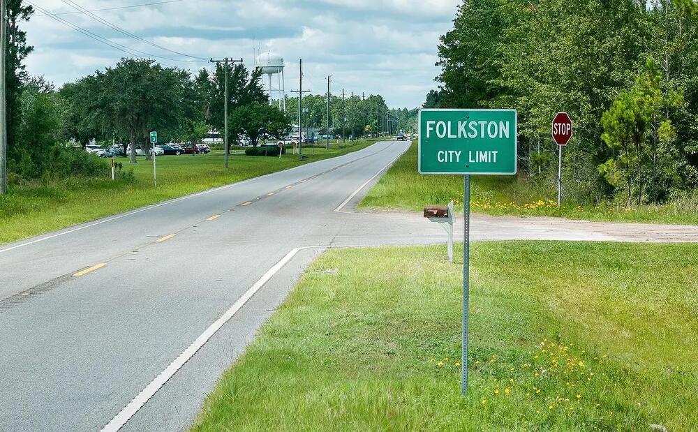 The Folkston city limit sign near the The Folkston ICE Processing Center and the D. Ray James Correctional Facility in Folkston, on July 2, 2025. Credit: Justin Taylor/The Current GA/CatchLight Local