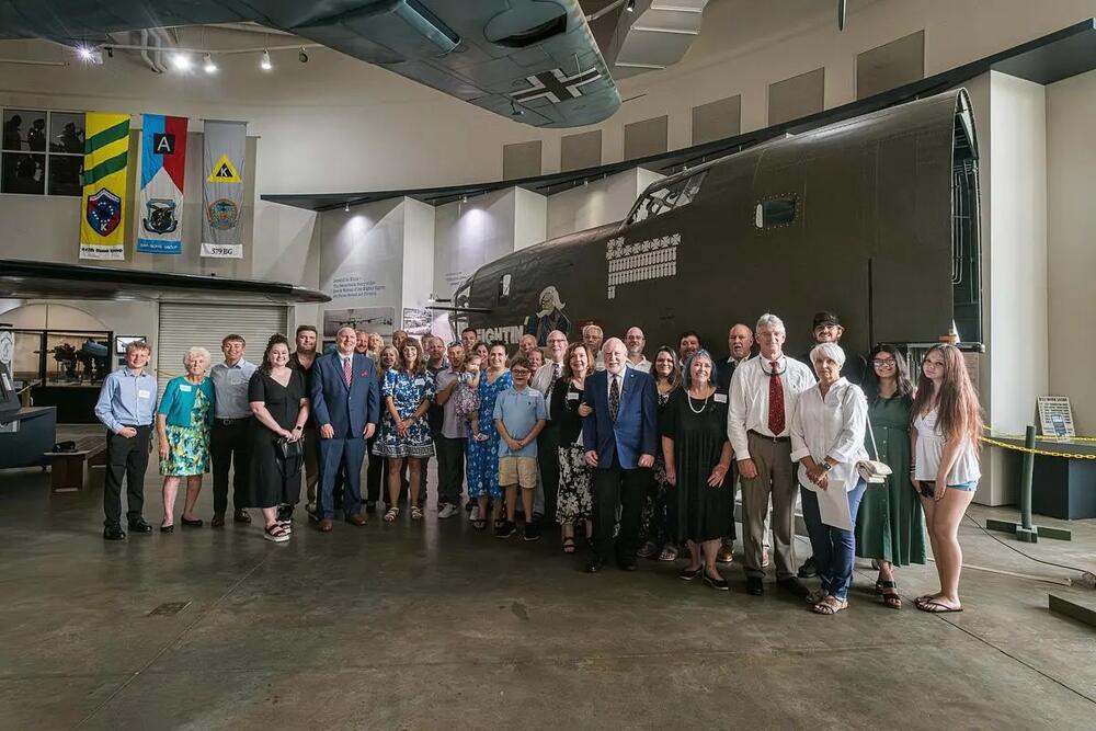 The family of 2Lt. Milton Leonard Hymes, Jr, stands in front of the nose section of a B-24 Liberator at the Mighty Eighth Air Force Museum in Savannah, on July 18, 2025.  Credit: Justin Taylor/The Current GA/CatchLight Local