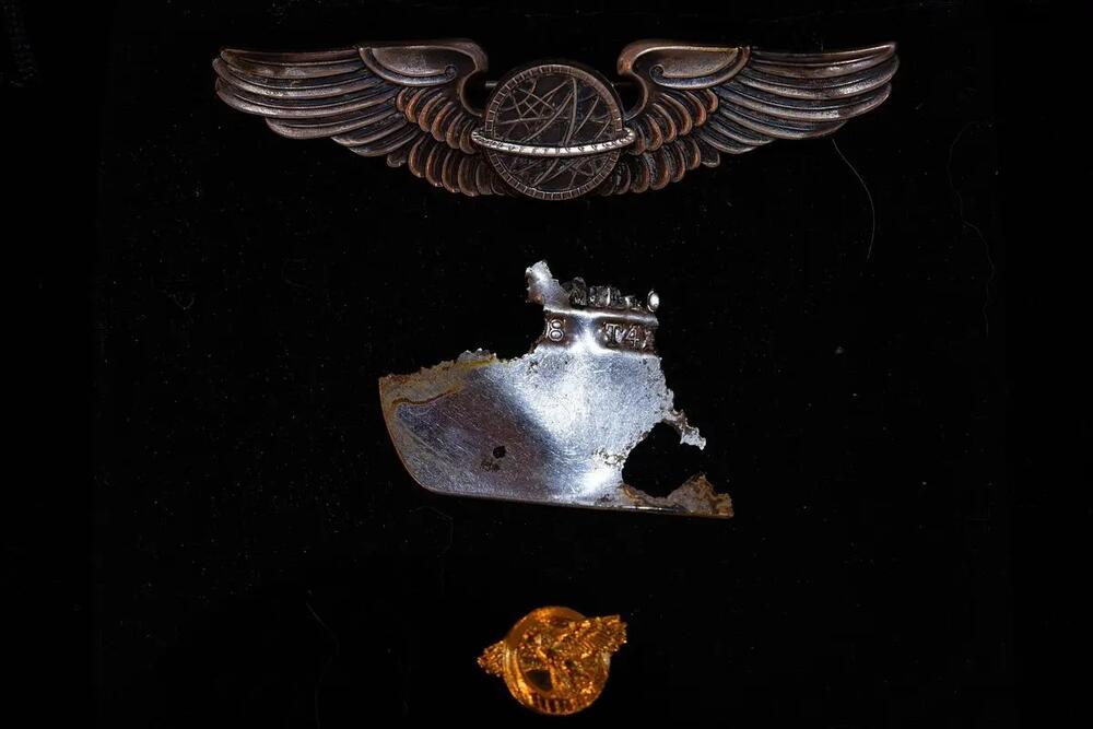 The fragment of an identification tag belonging to 2Lt. Milton Leonard Hymes, Jr recovered from the wreckage of his B-24. In Savannah, on July 18, 2025. This piece of material evidence was used to identify the remains.  Credit: Justin Taylor/The Current GA/CatchLight Local