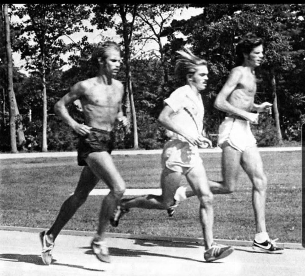 -Jeff Galloway (L) running with the mythical Steve Prefontaine.