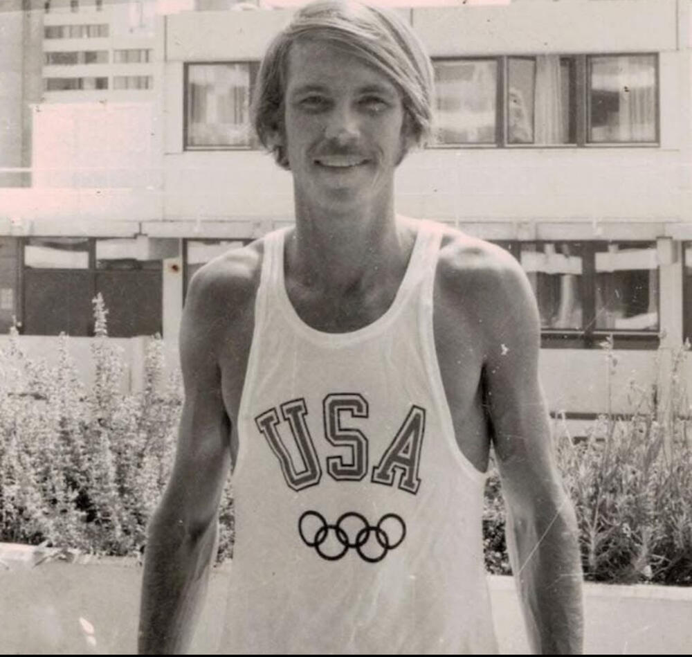 Jeff Galloway poses in team USA shirt.