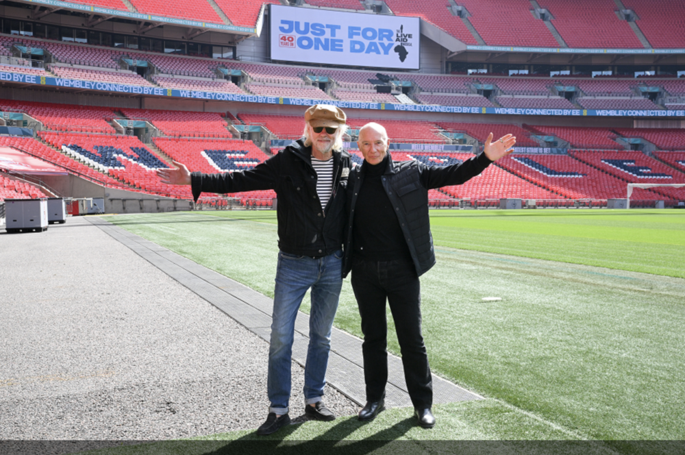 Bob Geldof (left) and Midge Ure are pictured inside Wembley Stadium for the launch of Just for One Day: The Live Aid Musical in London on May 1, 2025.