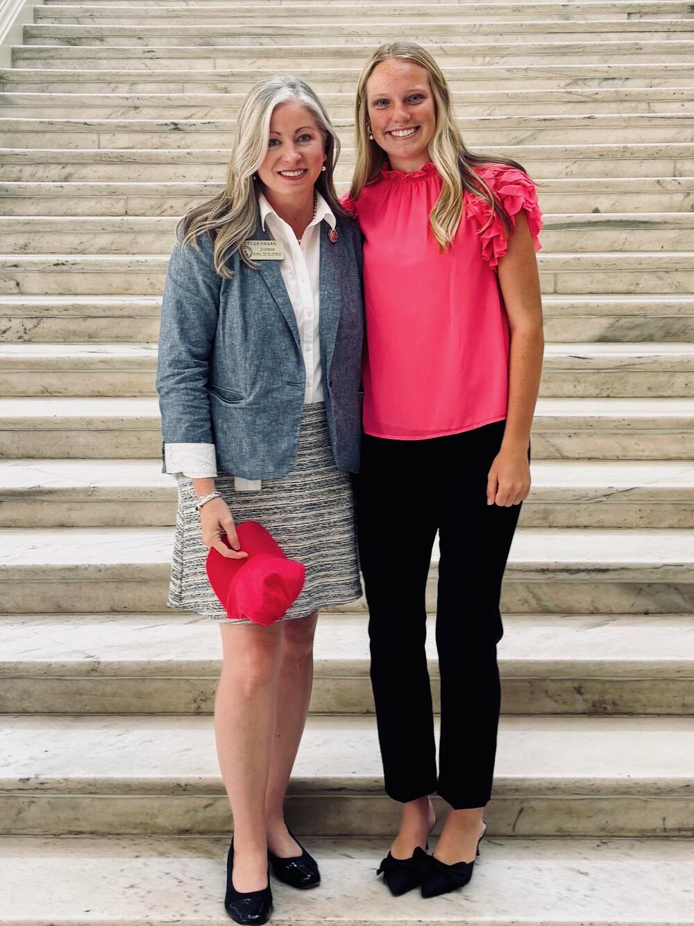Georgia state Rep. Leesa Hagan (R-Lyons, left) with Carly Lennig of Gwinnett County, who helped create a new law to allow hunters to wear fluorescent pink hunting garments.