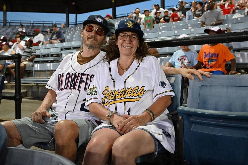 Jeffrey (left) and Ronda Swartzmiller, from Weirton, West Virginia, pose for a portrait during the Coastal Plains League All-Star Game on Monday, July 7, 2025, at Luther Williams Field in Macon, Georgia. The husband and wife pair attend baseball games at all levels across the United States. Katie Tucker/The Telegraph
