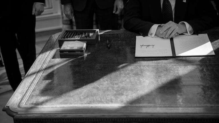 A black and white picture of the oval office.