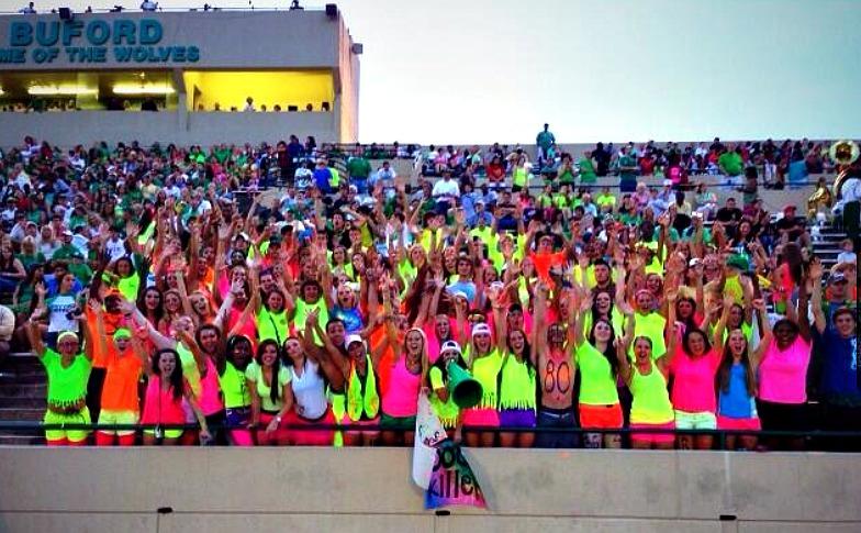 The Buford student section rocked bright neon get-ups as they cheered their Wolves onto a Week One victory against Elbert County