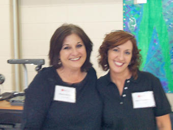 Organizers Wanda McClure and Nikki Robertson take a break for the cameras.