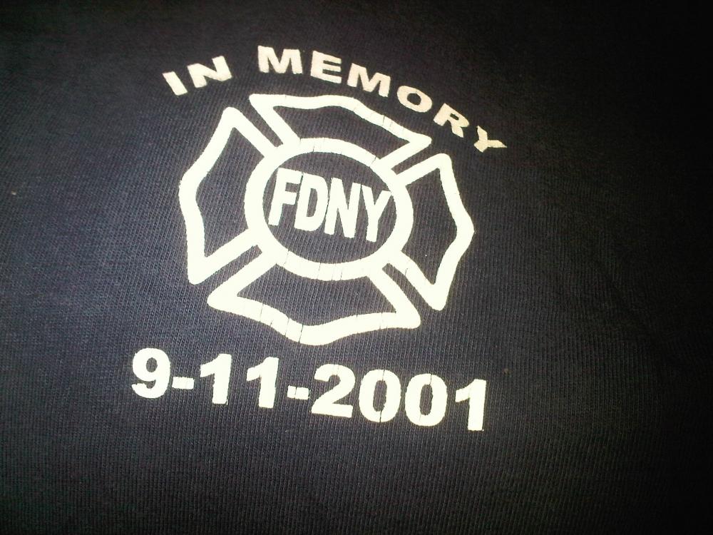 Sleeve of a t-shirt given to me by the NY Firefighters. I wear it every year on the anniversary of 9/11.