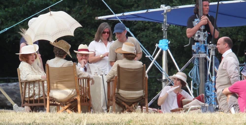 The Levinsons preside over a Downton garden party.