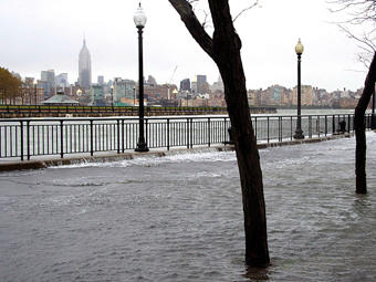 The Hudson River swells and rises over the banks of the Hoboken, NJ. Photo courtesy Charles Sykes/AP The Hudson River swells and rises over the banks of the Hoboken, NJ. Photo courtesy Charles Sykes/AP