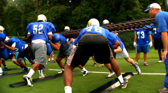 The McEachern Indians spend quality time on the field in preparation for Saturday's contest against the Brookwood Broncos.