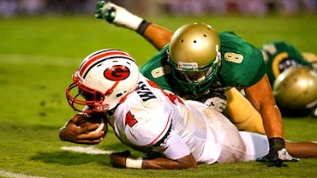 Gainesville Quarterback Deshaun Watson is taken down by a tackle on a carry.