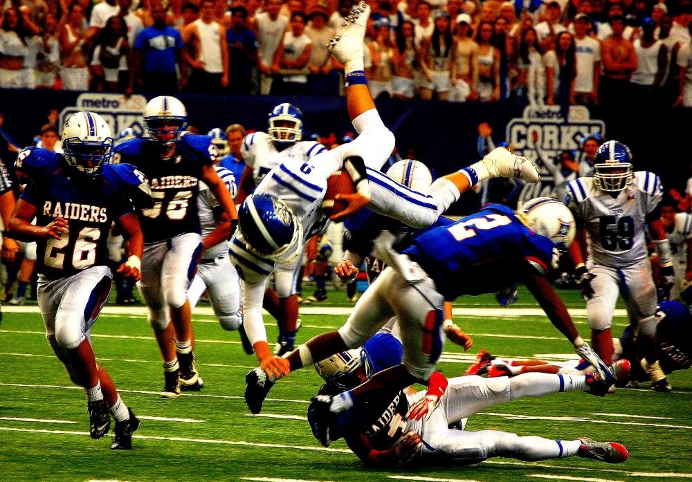 The Peachtree Ridge Lions carry the ball on the their way to a victory over the Walton Raiders.