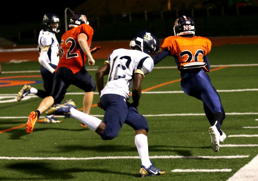 North Springs' Fabian Lumpkin returns an interception to score with 1:30 left to seal a Spartan victory. Photo by: David King North Springs' Fabian Lumpkin returns an interception to score with 1:30 left to seal a Spartan victory. Photo by: David King