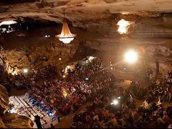 Crowd gathered for a concert inside a cave in Underground Bluegrass/ pbs.org/arts