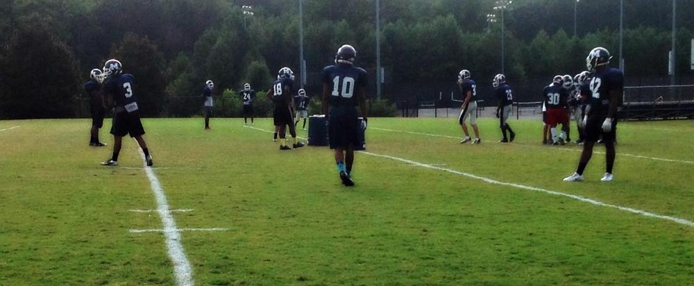 Ty practices with the linebackers Wednesday before his team meets their rival McEachern Indians at Northcutt Stadium