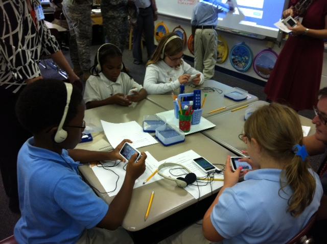 Students doing high-tech work at Taylor's Creek Middle School