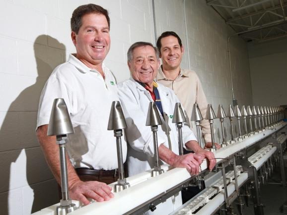 Geno Gasbarro (center) is the man behind much of the chicken consumed in the U.S. (photo courtesy of Dispatch.com)
