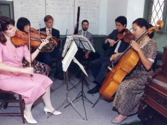 Of the six friends of the couple playing at this wedding, only two make their living as instrumentalists. (Photo: Jon Reis.)