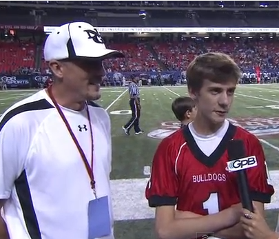 GPB Sports interviews Cooper as North Gwinnett takes on Camden County at the Georgia Dome on August, 2013.