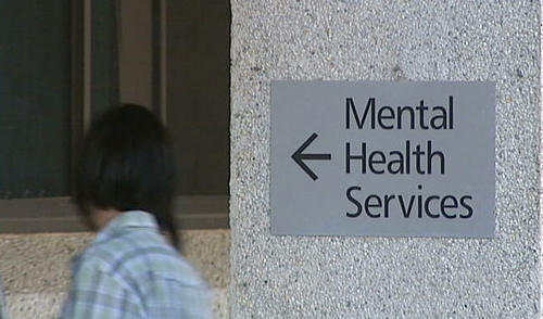 A person walks into a mental health clinic.