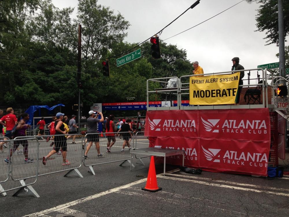 Runners Enjoy Wet Peachtree Road Race Public Broadcasting