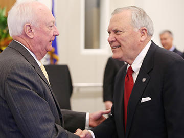 Gov. Nathan Deal shakes hands with an attendee of a recent event. 