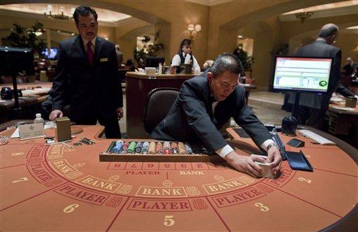 Baccarat table at the MGM Grand Hotel and Casino in Las Vegas. MGM Resorts International, which owns the MGM Grand, will speak before Georgia lawmakers this week. (AP Photo/Julie Jacobson)