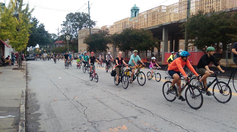Cyclists ride by during Atlanta Streets Alive, an event produced by the Atlanta Bicycle Coalition. (Trevor Young/GPB News) Cyclists ride by during Atlanta Streets Alive, an event produced by the Atlanta Bicycle Coalition. (Trevor Young/GPB News)