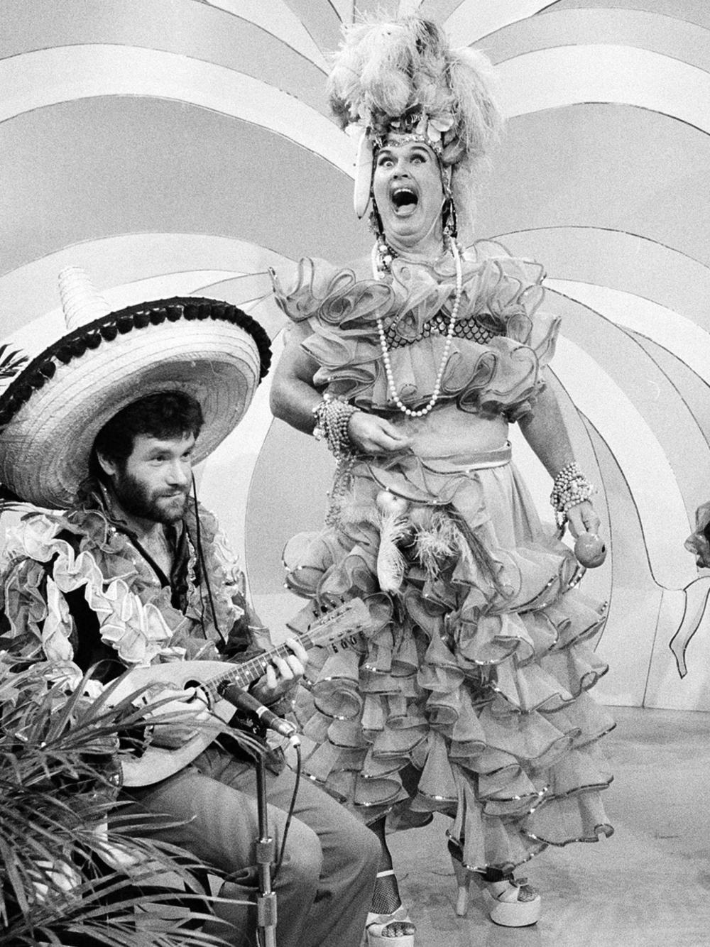 In 1983, Scott delivered <em>Today</em>'s weather report dressed as Brazilian singer Carmen Miranda.