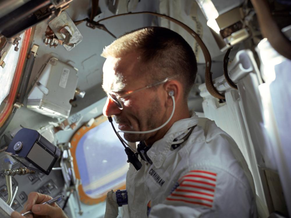 Lunar module pilot Walt Cunningham performs flight tasks on the ninth day of the Apollo 7 mission in 1968.