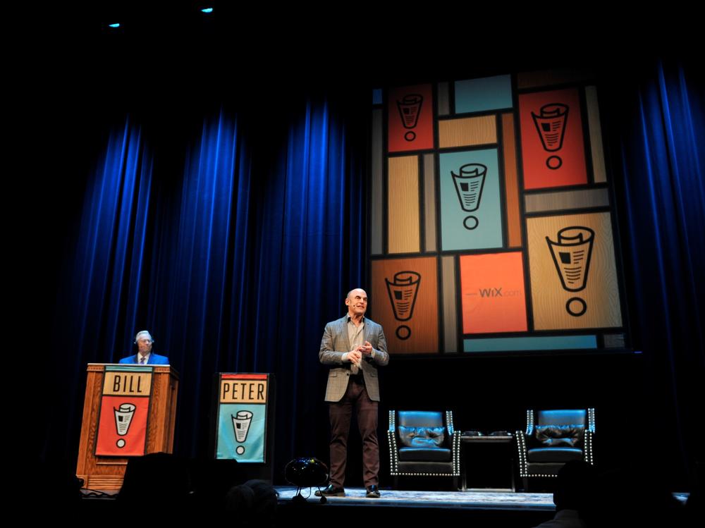 Peter Sagal and Bill Kurtis on stage