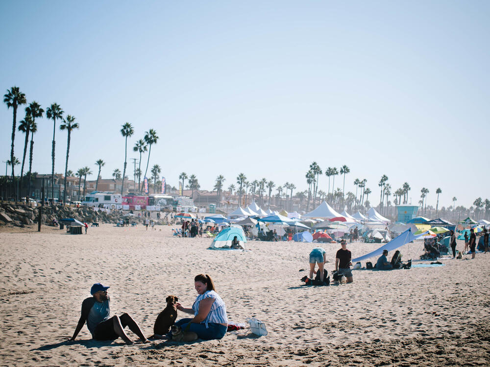 NPR's Sam Sanders helps Chloe Schofield, a busy special education teacher, transform her weekend into a relaxing mini-vacation at Huntington Dog Beach in Huntington Beach, Calif.