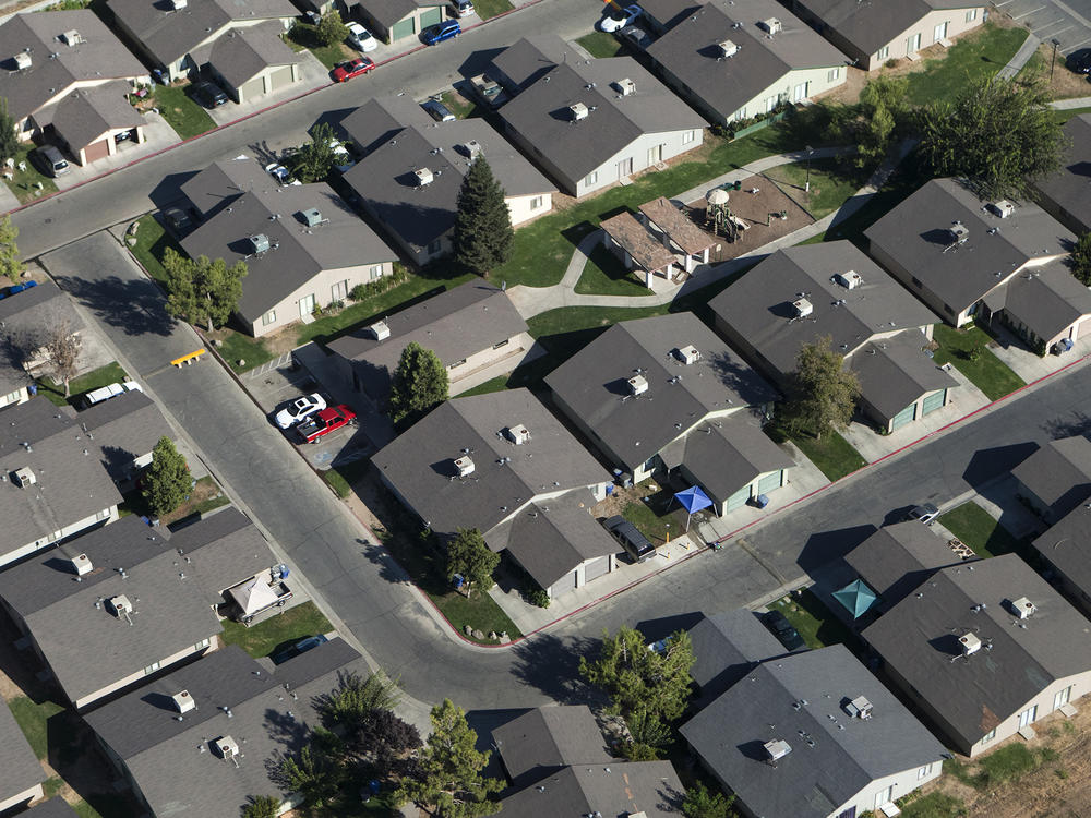 Lawmakers in California say the state's pattern of single-family zoning is boosting carbon emissions.