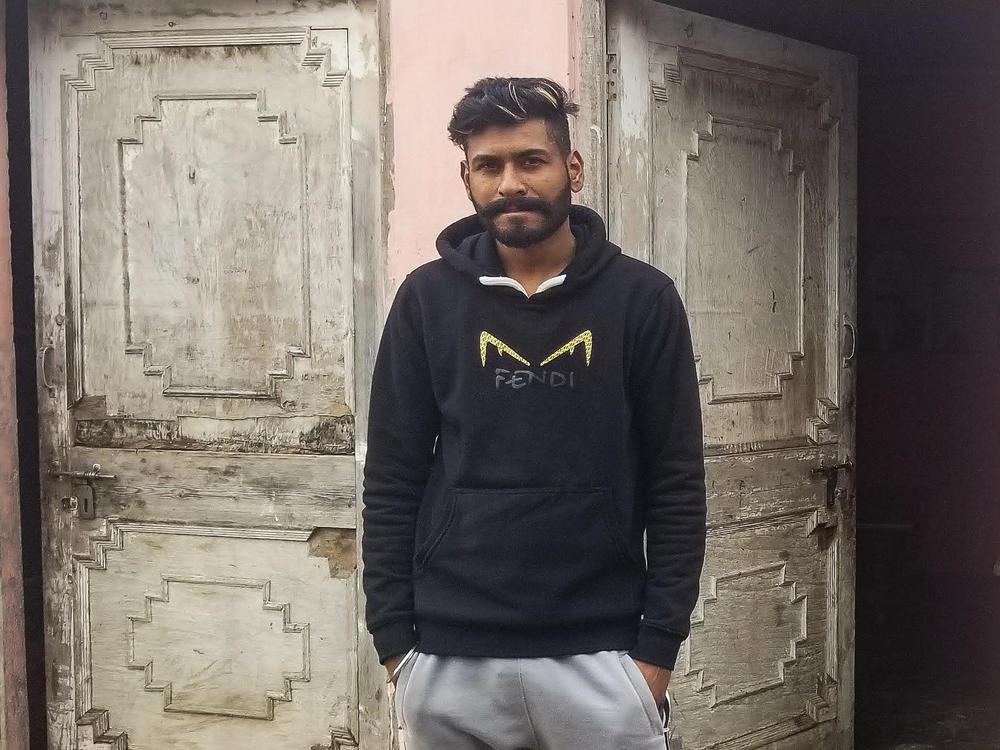 Sevak Singh, 26, in front of his family's home in rural Punjab. Singh planned to cross the U.S.-Mexico border illegally but was deported from Mexico in October. He admits that he and other Punjabi Sikh migrants rehearsed fake backstories about being persecuted in India to try to win asylum in the United States.
